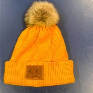 C.C. Pom hat